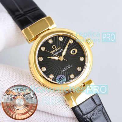 Swiss Replica Omega 34mm De Ville Ladymatic Yellow Gold Case Black Face Watch 